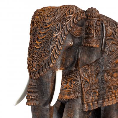 An Indian carved hardwood elephant