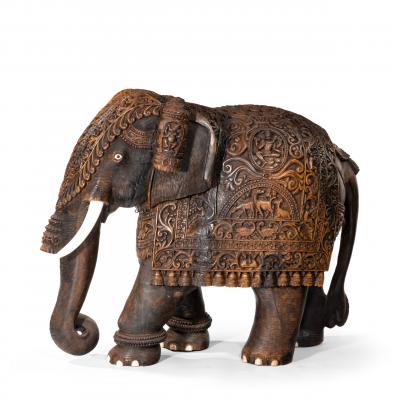 An Indian carved hardwood elephant