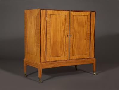 An Interesting Pair Of Satinwood Two Door Cabinets En Quatre Face