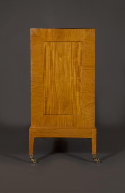 An Interesting Pair Of Satinwood Two Door Cabinets En Quatre Face