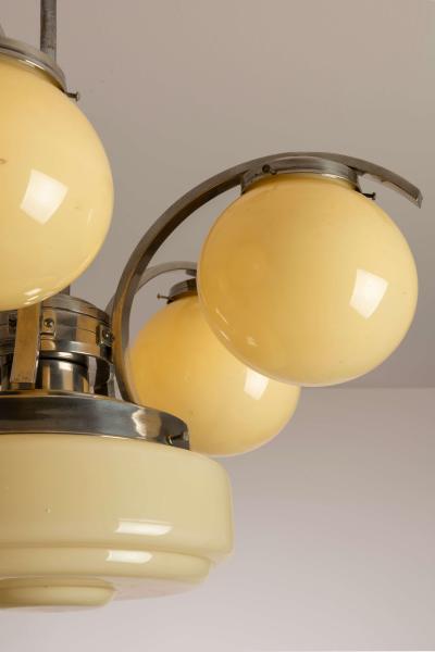 An Italian metal and glass art deco chandelier 1940s