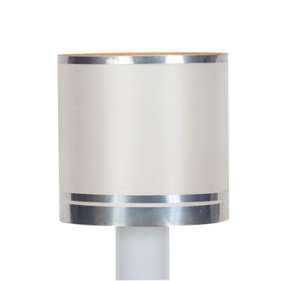 An Italian mid century modern floor lamp in polished chrome and opaline glass