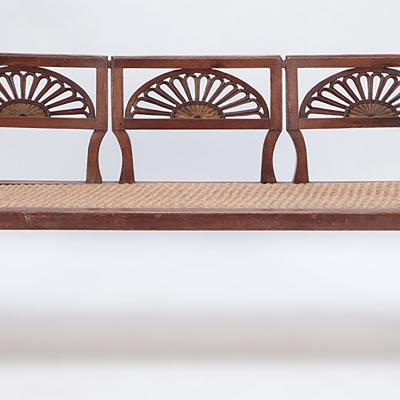 An Italian walnut sofa with cord seat cutout design Circa 1800 