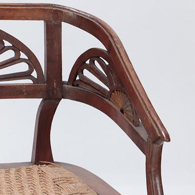An Italian walnut sofa with cord seat cutout design Circa 1800 