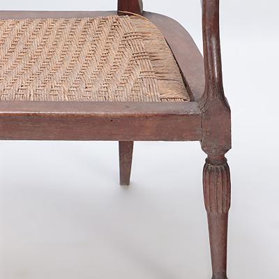 An Italian walnut sofa with cord seat cutout design Circa 1800 