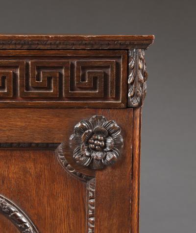 An Oak Two Door Folio Cabinet With Carved Kentian Detailing