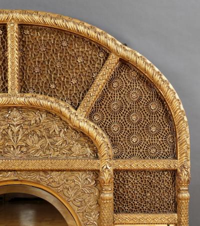 An Overmantel Mirror With Panels Of Mughal Inspired Carved Geometric Tracery