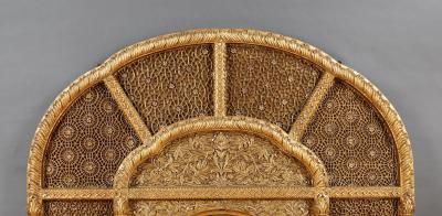 An Overmantel Mirror With Panels Of Mughal Inspired Carved Geometric Tracery