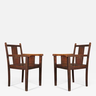 An Pair of Oak Aesthetic Period Armchairs Carved with Greek Mey Motifs