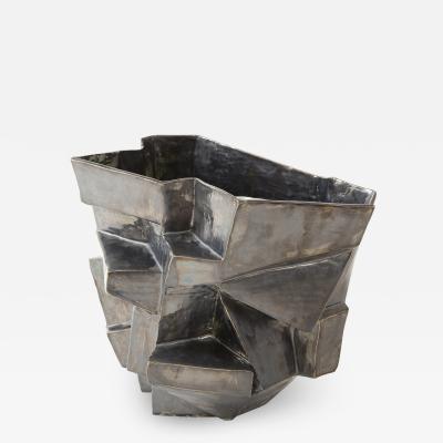 An R A Pesce wheel thrown cubist vessel in white stoneware