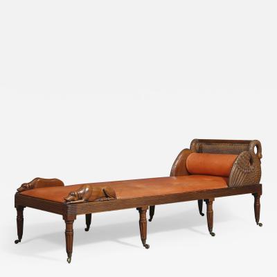 An Unusual Carved Walnut Daybed Related To A Design By Thomas Hope