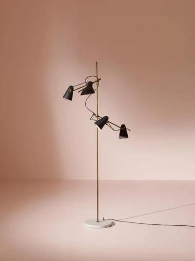 An adjustable Italian midcentury floor lamp with four lights brass and marble