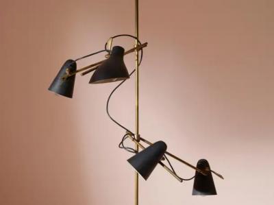 An adjustable Italian midcentury floor lamp with four lights brass and marble