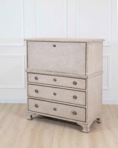 An antique Swedish bureau in antique white