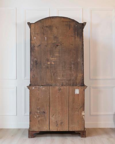 An antique Swedish two piece cupboard in black and grey