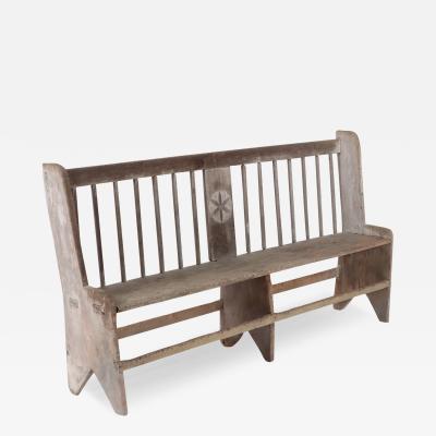 An antique wooden bench circa 1800 