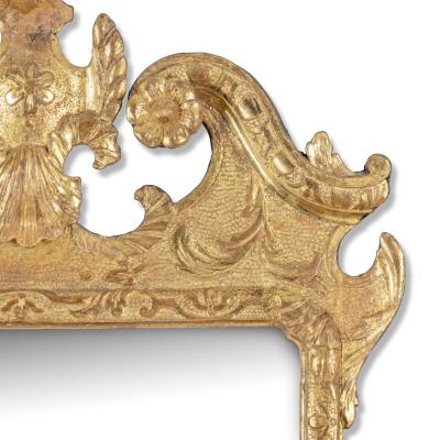 An attractive late George I giltwood mirror