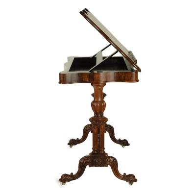 An early Victorian rosewood reading table