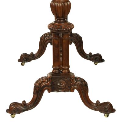 An early Victorian rosewood reading table