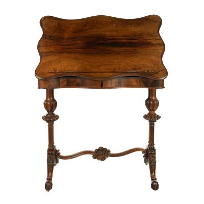 An early Victorian rosewood reading table