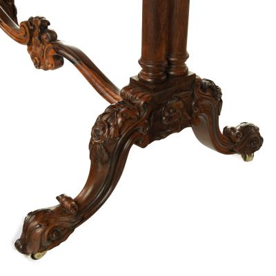 An early Victorian rosewood reading table