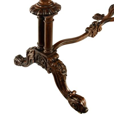An early Victorian rosewood reading table