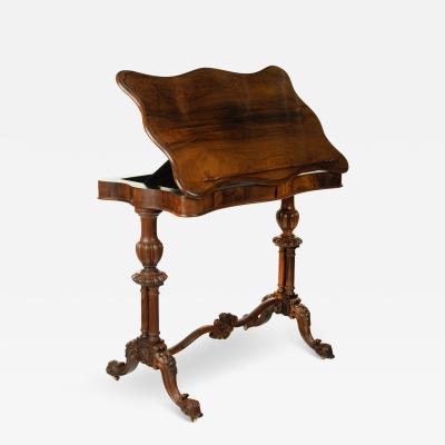 An early Victorian rosewood reading table