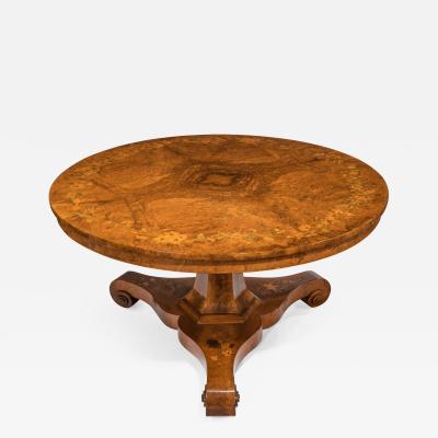 An early Victorian walnut marquetry centre table