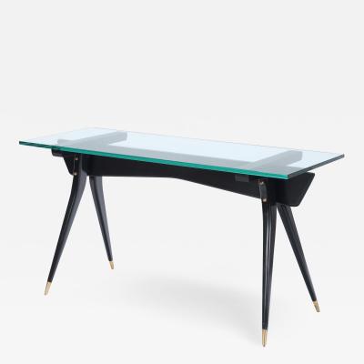 An ebonized wood glass top console table circa 1950 