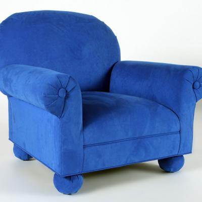 An electric blue upholstered custom made roll arm club chair Circa 1995 