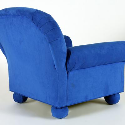 An electric blue upholstered custom made roll arm club chair Circa 1995 