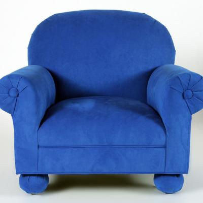 An electric blue upholstered custom made roll arm club chair Circa 1995 