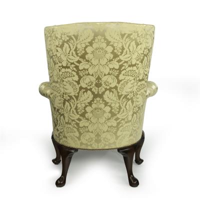 An elegant George I walnut wing armchair