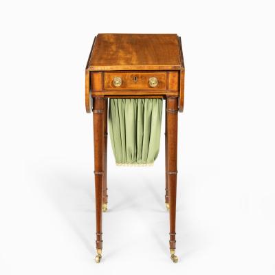 An elegant George III mahogany Pembroke sewing table