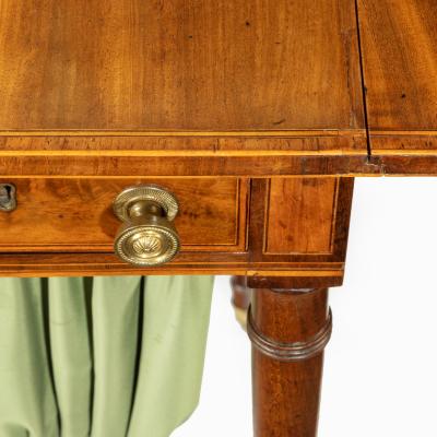 An elegant George III mahogany Pembroke sewing table