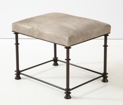 An elegant bronze stool covered with nubuck retourn 