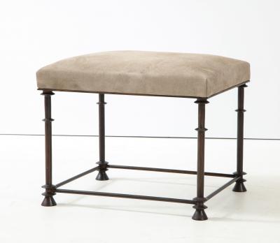 An elegant bronze stool covered with nubuck retourn 