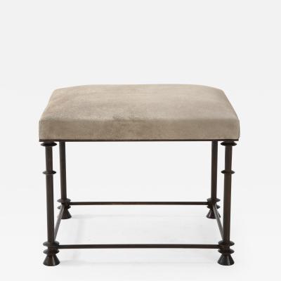 An elegant bronze stool covered with nubuck retourn 