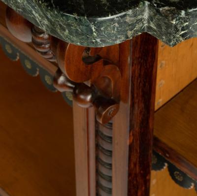 An extensive William IV Goncalo Alves breakfront open book case