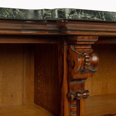 An extensive William IV Goncalo Alves breakfront open book case