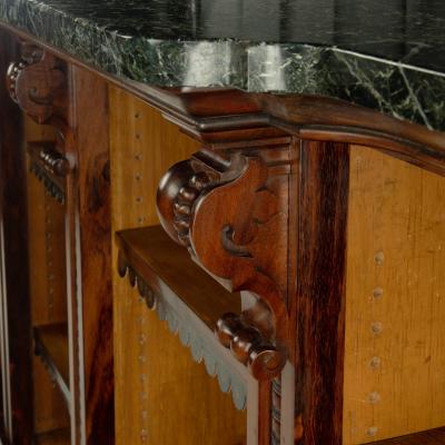 An extensive William IV Goncalo Alves breakfront open book case