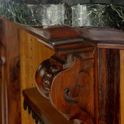 An extensive William IV Goncalo Alves breakfront open book case