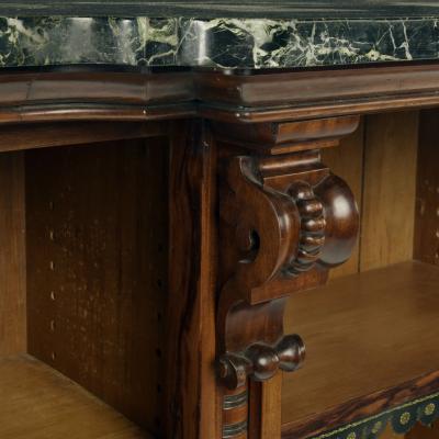 An extensive William IV Goncalo Alves breakfront open book case