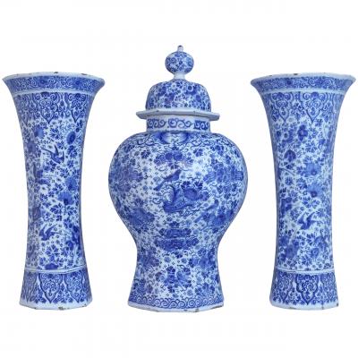 An important and large Dutch Delft garniture set of three vases