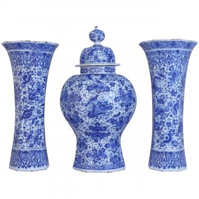 An important and large Dutch Delft garniture set of three vases