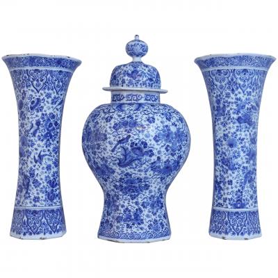 An important and large Dutch Delft garniture set of three vases