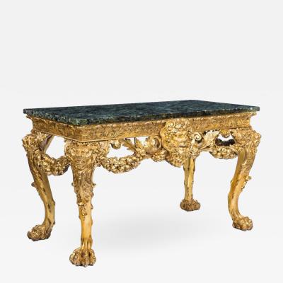 An imposing Victorian gilt wood console table in the manner of William Kent