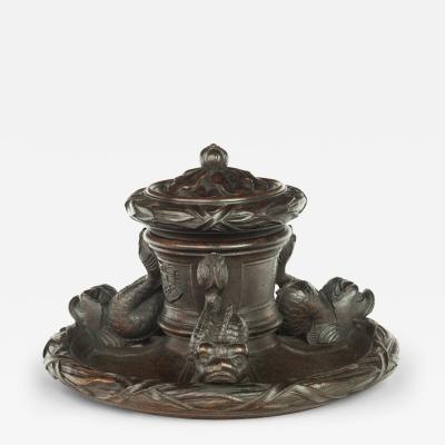 An oak inkwell carved from Lutine timber dated 1799