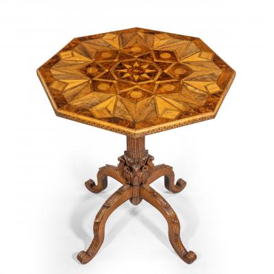 An octagonal indigenous specimen wood marquetry table