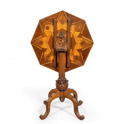 An octagonal indigenous specimen wood marquetry table